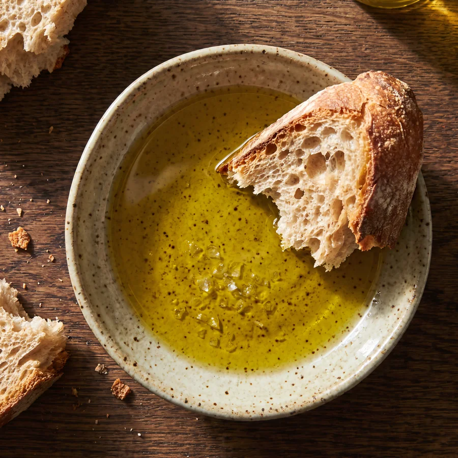 Bread dipped in olive oil